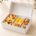 Unbranded family morning breakfast box with pastries, fruit and juice compartments